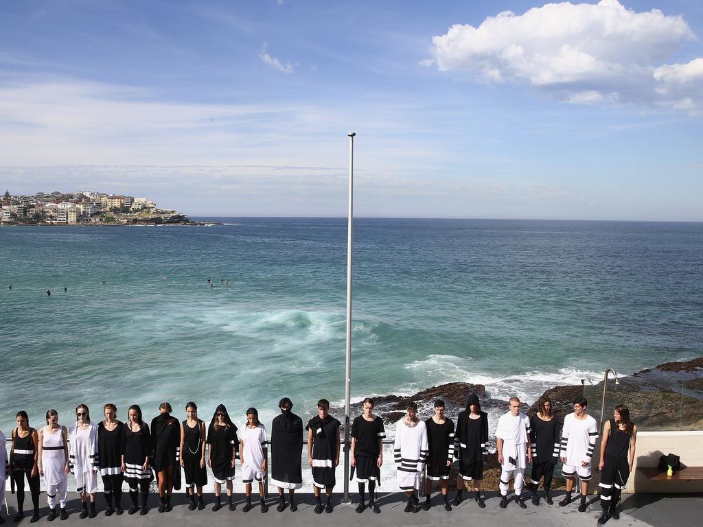 Models showcase designs during the Ten Pieces show at Mercedes-Benz Fashion Week Australia 2015 at Bondi Icebergs. Picture: Getty