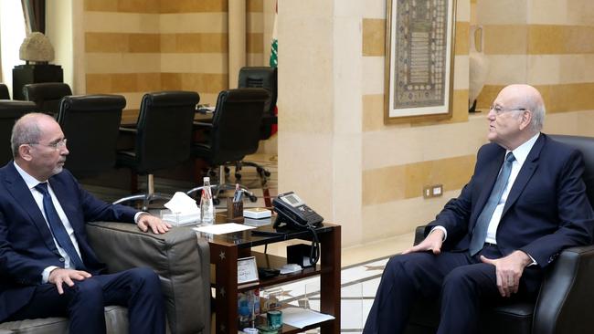 Lebanese Prime Minister Najib Mikati (R) with Jordan’s Foreign Affairs Minister Ayman Safadi (L) in Beirut this week. Picture: AFP.