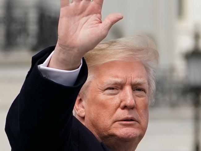 US President Donald Trump walks from the US Capitol after attending a St. Patrick’s Day lunch on March 15, 2018 in Washington, DC. / AFP PHOTO / MANDEL NGAN