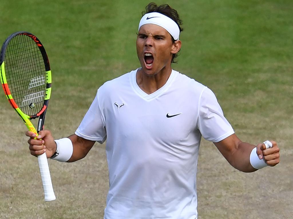 Spain's Rafael Nadal celebrates after beating US player Sam Querrey. (Photo by GLYN KIRK / AFP)