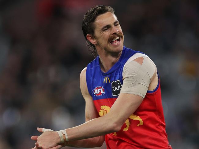 MELBOURNE, AUSTRALIA – AUGUST 17: Joe Daniher of the Lions reacts after missing a goal during the round 23 AFL match between Collingwood Magpies and Brisbane Lions at Melbourne Cricket Ground, on August 17, 2024, in Melbourne, Australia. (Photo by Daniel Pockett/Getty Images)