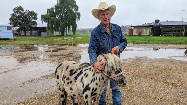 John Gill with Mr Spots, who is 34 years old, equivalent to 70 human years. Picture: Toby Vue