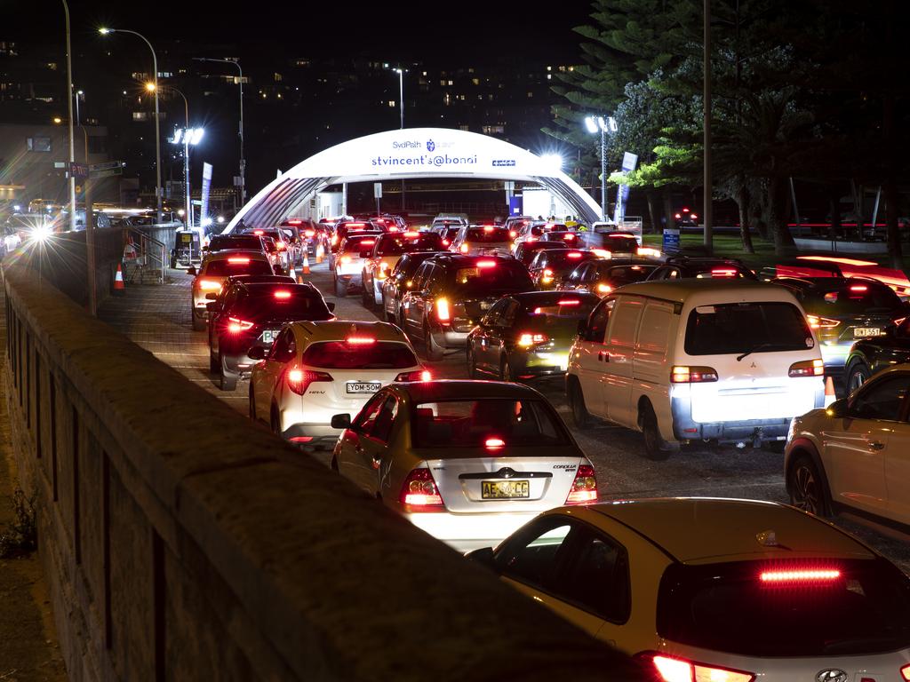 Last night there were large queues at the Bondi Beach drive-through Covid-19 testing clinic, as the cluster in Sydney's eastern suburbs continues to grow. Picture: Christian Gilles