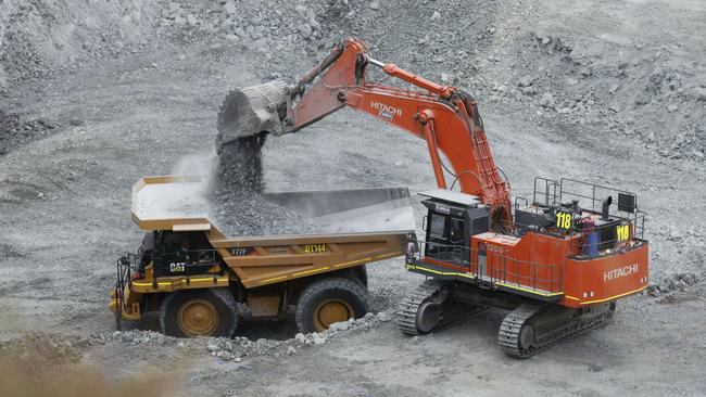 A raft of ASX-listed mining companies hit 12-month lows on Monday amid a growing sense the July quarterly reporting season will see a downgrade bloodbath.