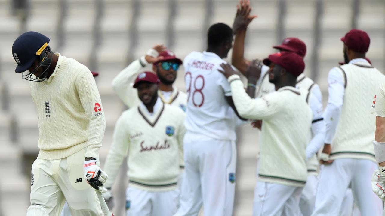 Jofra Archer of England leaves the field after being dismissed by West Indies captain Jason Holder.