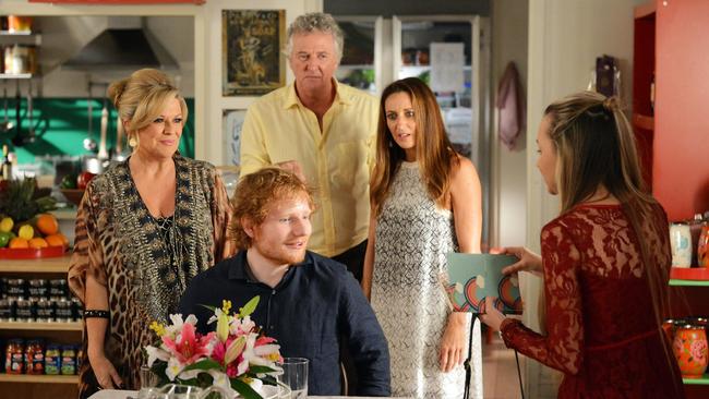Ed Sheeran with Emily Symons, Shane Withington and Georgie Parker on set of Home and Away in 2015.