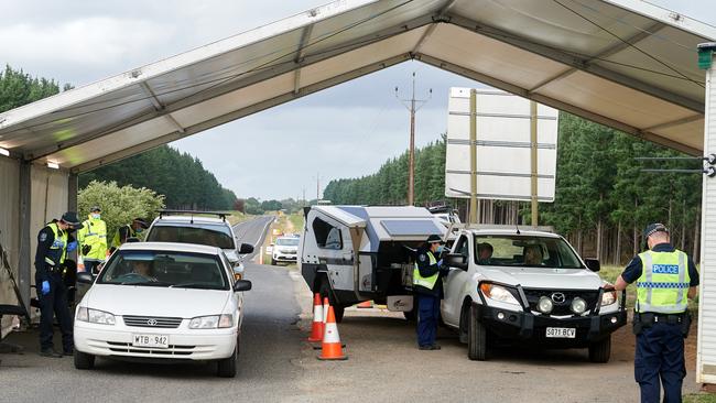 SA Police at a border checkpoint between South Australia and Victoria earlier this year. Picture: Frank Monger