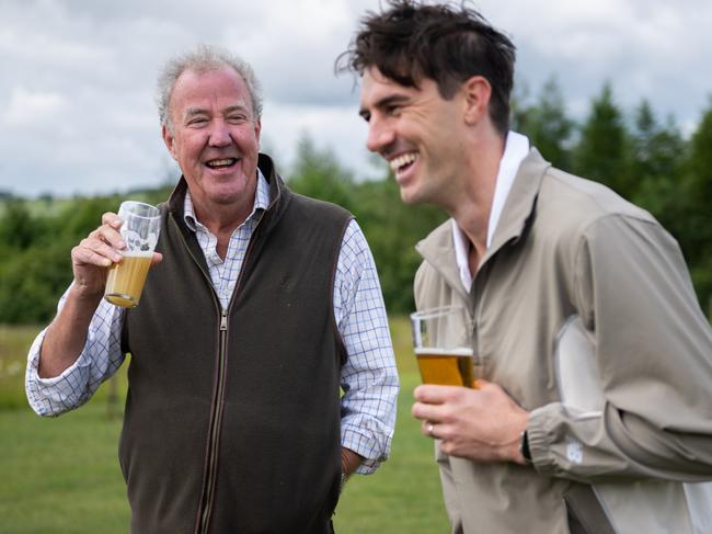 Cummins and Clarkson having a beer at the farm.