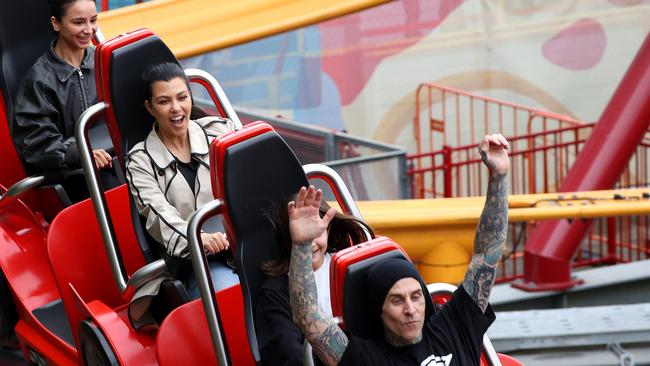 Kourtney Kardashian, Travis Barker and their family film in Australia for her TV show on a boat in Sydney Harbour and at Luna Park along with bandmate Tom De Long from Blink 182 on 15 February 2024. Picture: Matrix