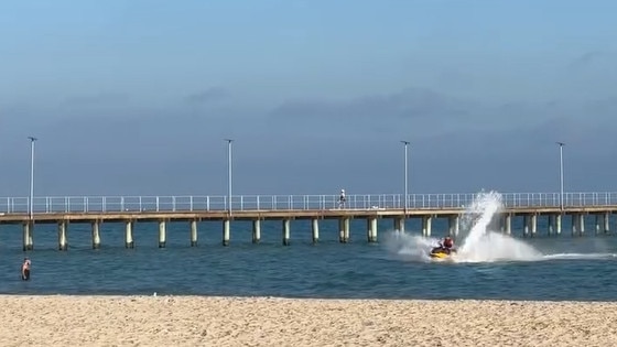 Jet ski hoons came dangerously close to a swimmer at Rye on the Mornington Peninsula. Picture: supplied