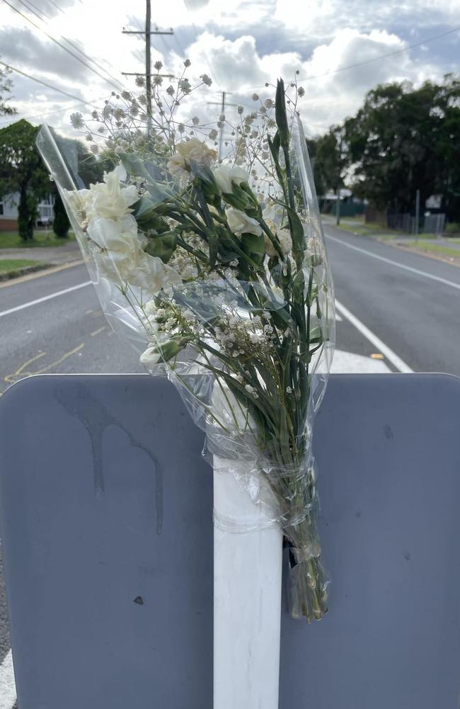 Memorial flowers at Robertson Road, Raceview, on January 8 following a fatal mobility scooter crash. Picture: Nicola McNamara