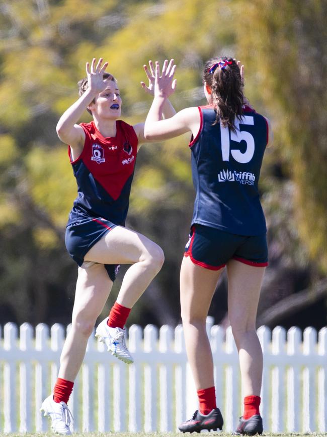 Womens AFL div 2 QFA grand final. Surfers Paradise vs Mt Gravatt Vultures. SP #18 Alana McNabb and #15 Mia Adams celebrate a goal. Sunday, August 25 2019. (AAP Image/Renae Droop)