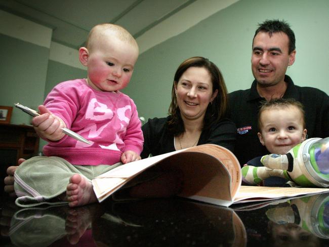 Tammie and Guy Wightman with their children Emma and Drew, and Australian Bureau of Statistics (ABS) mock census form at home at Osborne, SA 07 Aug 2005. family