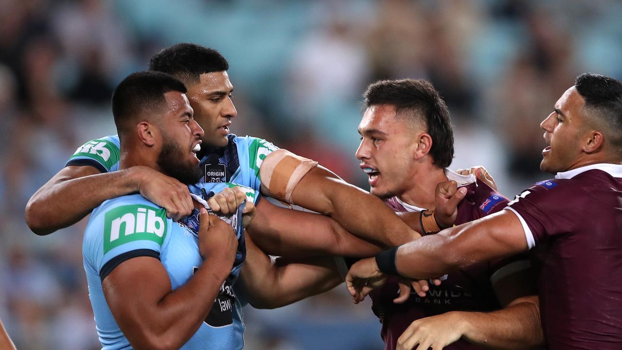 Payne Haas scuffles with Tino Fa'asuamaleaui during Origin II. (Photo by Mark Kolbe/Getty Images)