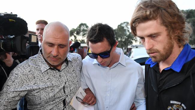 Salisbury West captain Adam Jones on his way to the Adelaide Footy League tribunal on Wednesday night. Picture: Brad Fleet.