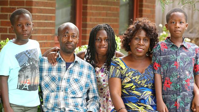 Parfait Bukuru Bulinyanya and his wife Riziki Merry Anuarite with their 12-year-old daughter Ornella (middle) and 10-year-old twins Gabriel, left, and Daniel. Picture: Alison Wynd