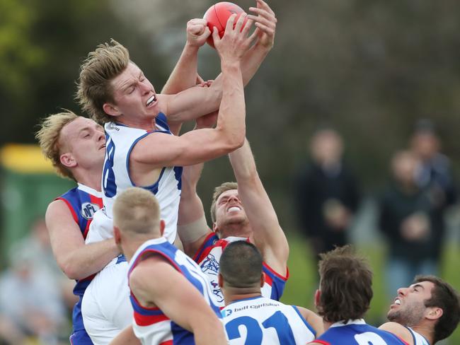 Aidan Tilley soars over the pack. Picture: David Crosling