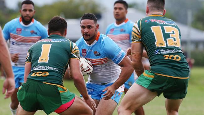 Pride’s Steven Tatipata runs the ball up in the pre season trial match between the Northern Pride and the Cairns Foley Shield side, held at Petersen Park, Edmonton. PICTURE: BRENDAN RADKE