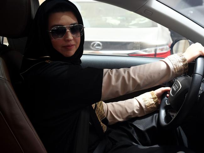 Daniah al-Ghalbi, a newly-licensed Saudi woman driver, sits in her car during a test-drive in the Red Sea resort of Jeddah on June 23, 2018. Picture: AFP