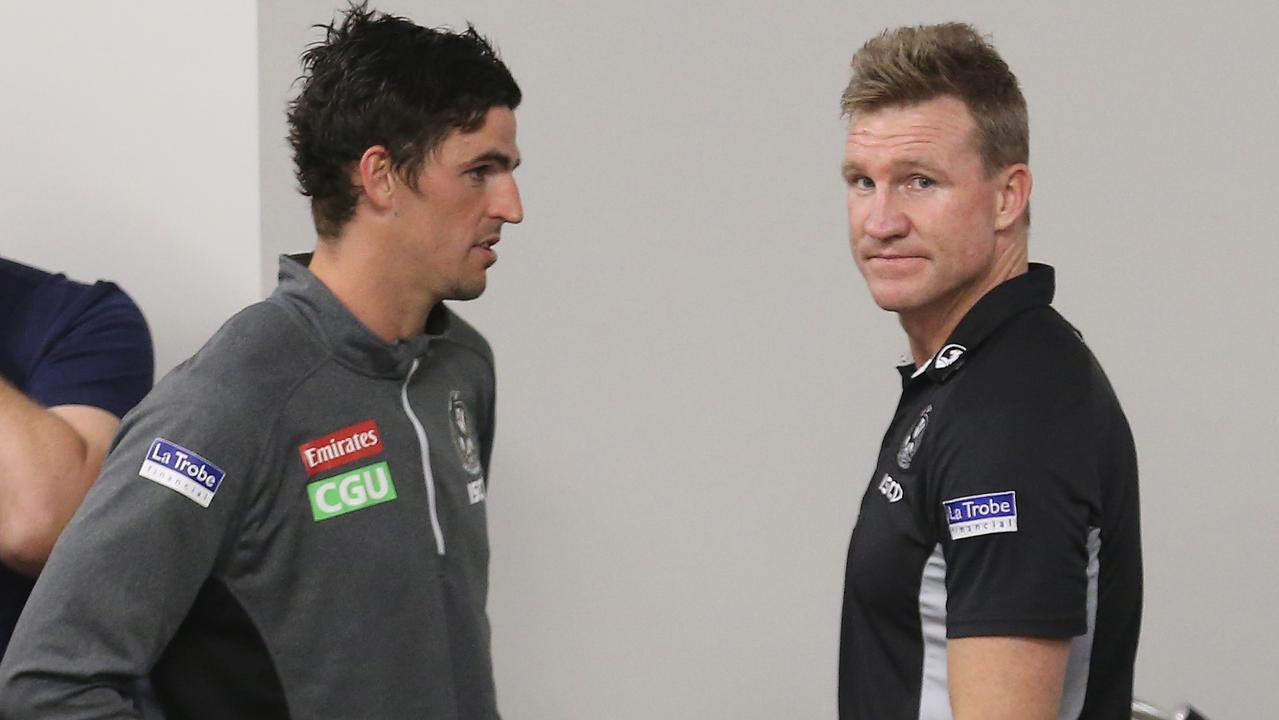 Collingwood’s Scott Pendlebury with coach Nathan Buckley. (Photo by Jason O'Brien/AFL Media/Getty Images)