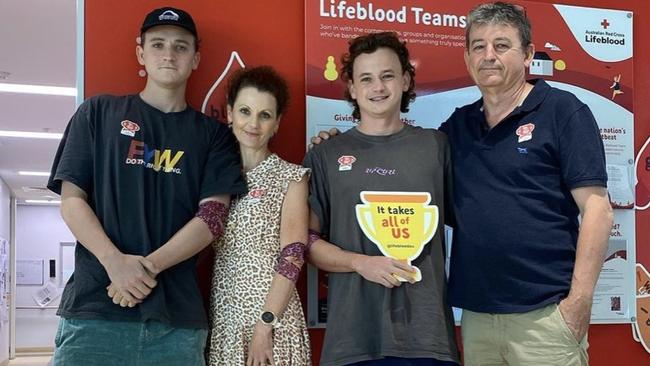 Noah Smith (left) with family in hospital.