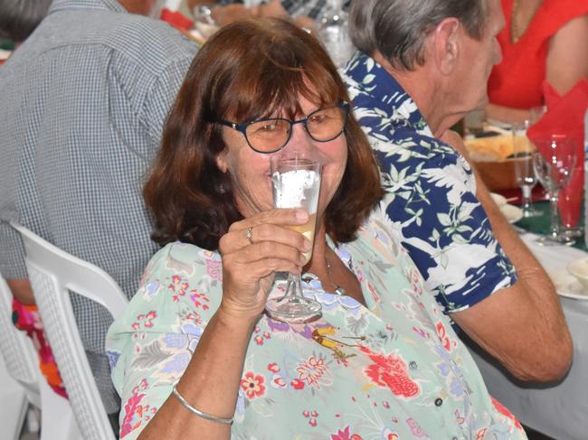 An Italian long lunch enjoyer raises a glass for the Apple and Grape Festival, February 25, 2024.