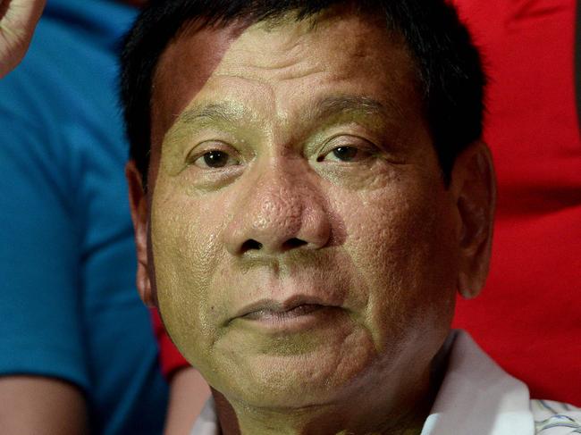 Philippine presidential front-runner candidate Rodrigo Duterte gestures during a campaign in Manila on April 23, 2016. Philippine presidential candidate Rodrigo Duterte renewed his vow to 