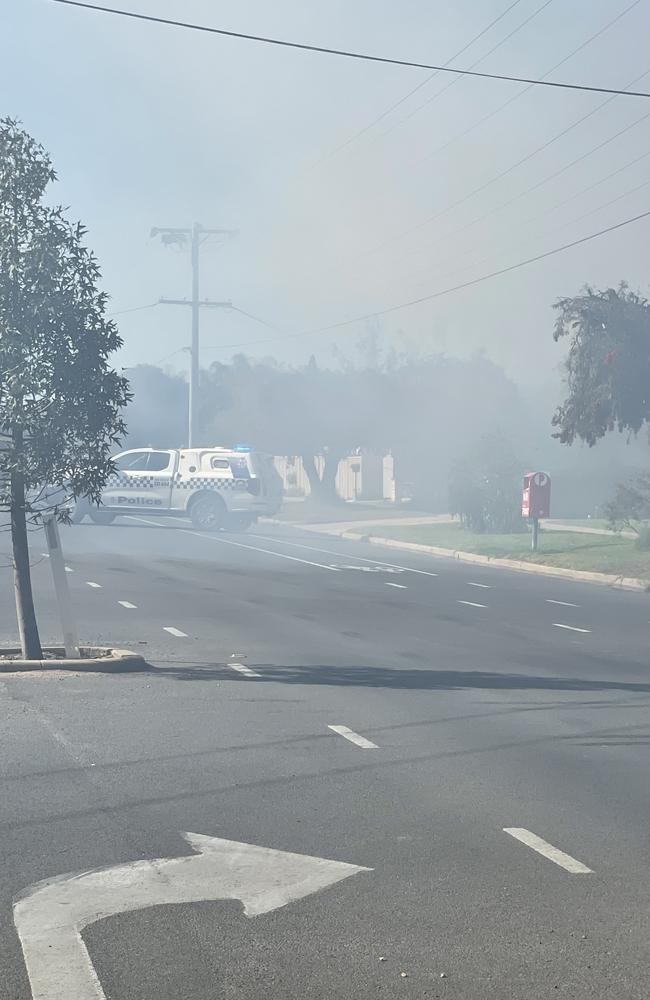 Clouds of smoke filled the air and Eleventh St as firefighters fought a house fire. Picture: Stuart Kavanagh