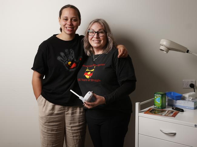 Client Sienna Scotney-Barron with Tina Goodwin TAC alcohol and other drugs coordinator.   The Tasmanian Aboriginal Centre (TAC) is on a mission to reduce smoking rates and drive better health outcomes for Aboriginal communities, with the rollout of new Smokerlyzer technology across its five health clinics around the state.  Picture: Nikki Davis-Jones