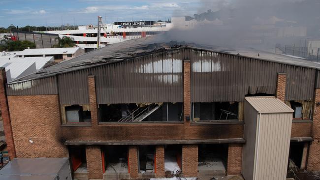 The fire at the Rent A Space self storage complex at Brookvale burned for four days last year. Customers are close to finding out what caused the blaze. Picture: Monique Harmer