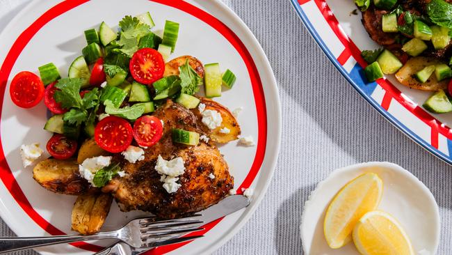 One-tray chicken with a cucumber and tomato salad. Photo: Nikki To / TWAM