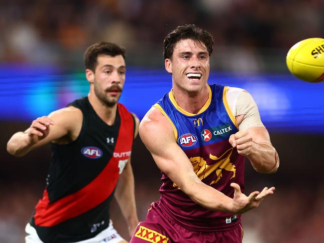 Noah Answerth gets a handball away. Picture: Chris Hyde/AFL Photos/via Getty Images