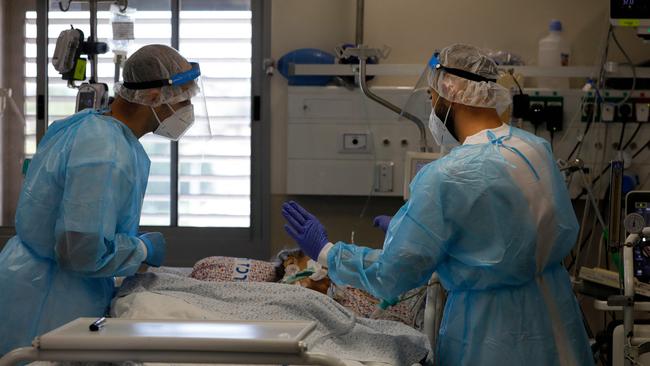 Israeli medics tend a Covid-19 patient at the Ziv Medical Centre in the city of Safed on Thursday. Picture: AFP