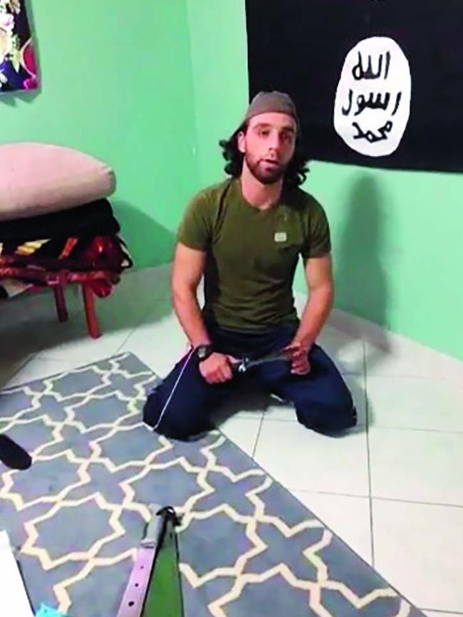 Omar al Kutobi makes a martyrdom video in his Fairfield home. Pic: supplied