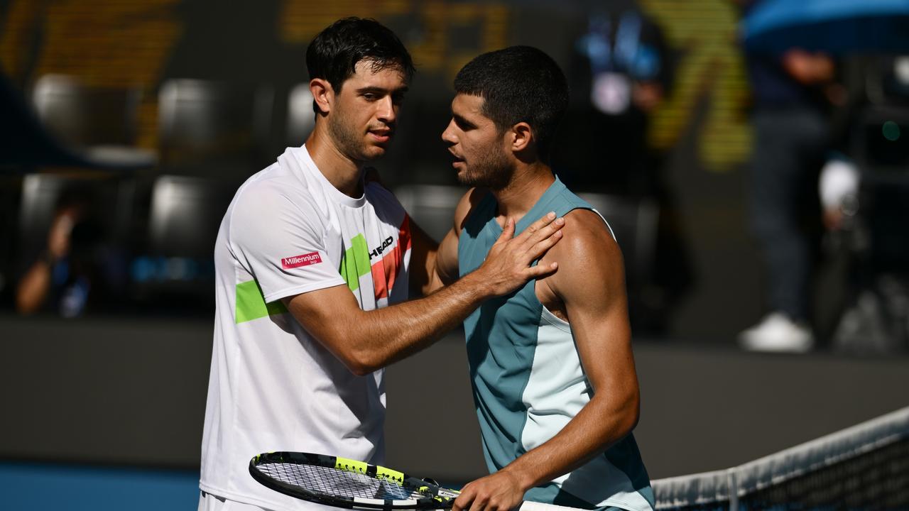 Alcaraz (right) duly knocked out Nuno Borges. (Photo by Quinn Rooney/Getty Images)