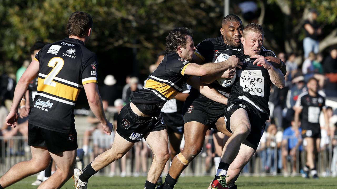 Redfern's Jay Belgrove with the ball. Picture: John Appleyard