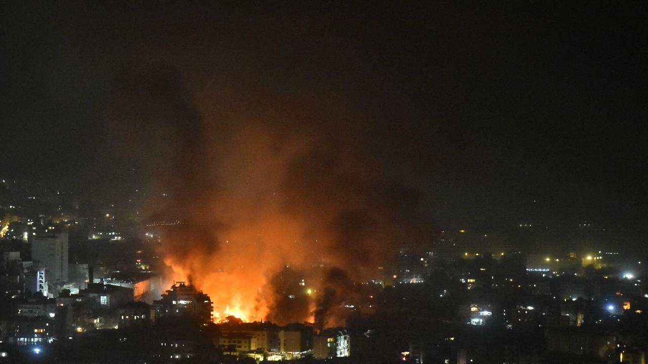 Smoke billows from the site of an Israeli air strike that targeted a neighbourhood in Beirut’s southern suburb early on September 28, 2024.\\ (Photo by Fadel ITANI / AFP)