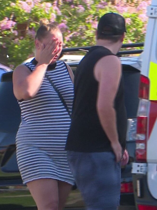 A distraught woman outside the Chester Hill home. Picture: TNV