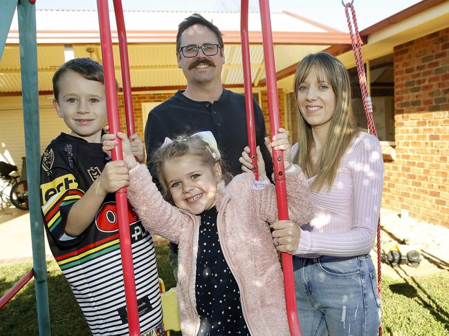 Tim and Samantha  Randall with their children Michael -7 and Isabelle -4. They are selling their St Clair home and moving to Lake Macquarie. Pictyure: John Appleyard