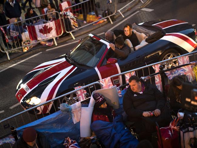 People camping outside Windsor Castle hoping to catch a view of the bride and groom. Picture: AP/Emilio Morenatti