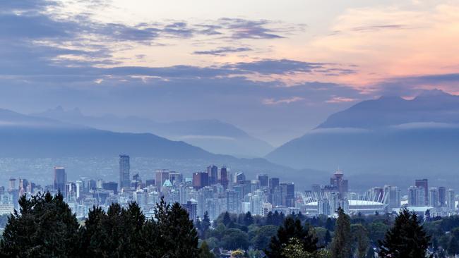 Vancouver skyline at dusk from Queen Elizabeth Park.