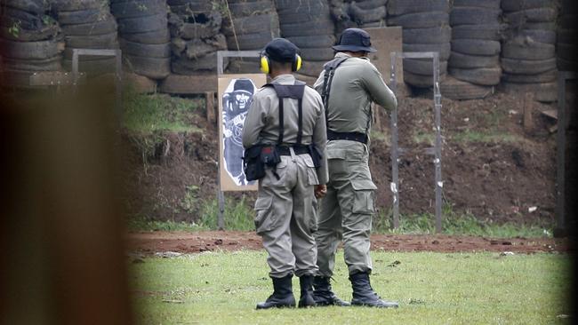 Indonesia’s Brimob police shooting at life-size targets in the lead up to the 2008 executions of Bali bombers Amrozi, Mukhlas and Imam Samudra.