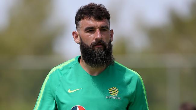 Socceroos captain Mile Jedinak leads by example. Picture: Toby Zerna