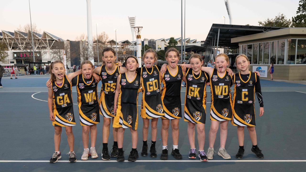 Bannockburn Tigers under-11 netball team pull their funniest faces.