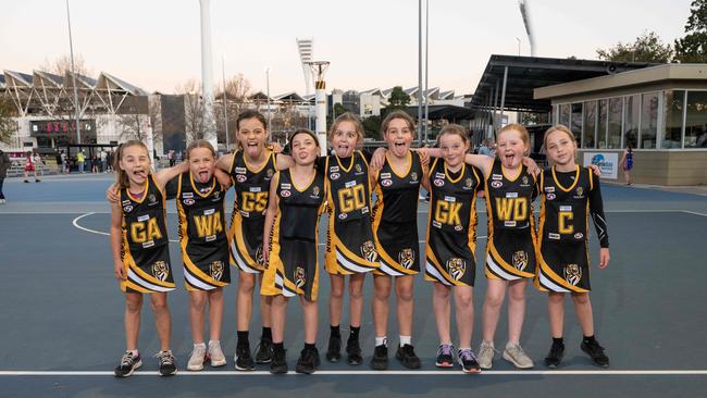 Bannockburn Tigers under-11 netball team pull their funniest faces.
