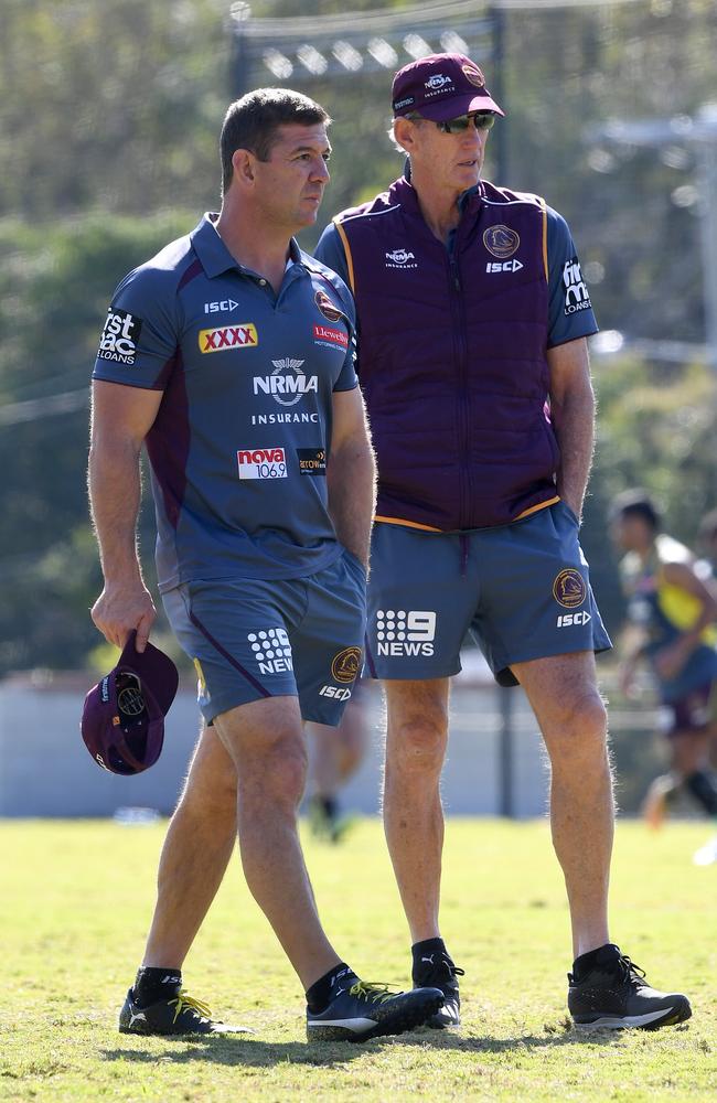 Jason Demetriou (left) and Wayne Bennett at a Broncos training session in 2018. Picture: AAP Image/Dave Hunt