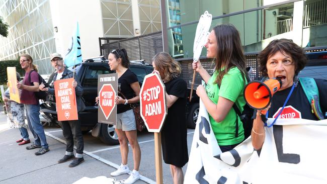 Anti Adani protesters are seen outside a hotel where Prime Minister Scott Morrison announces the government's climate package at a function in Melbourne. Monday, February 25. 2019. Picture: David Crosling(AAP Image/David Crosling) NO ARCHIVING,