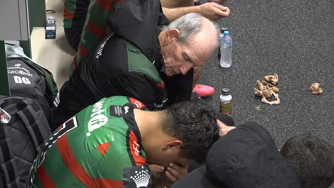 Latrell Mitchell receives support from coach Wayne Bennett.