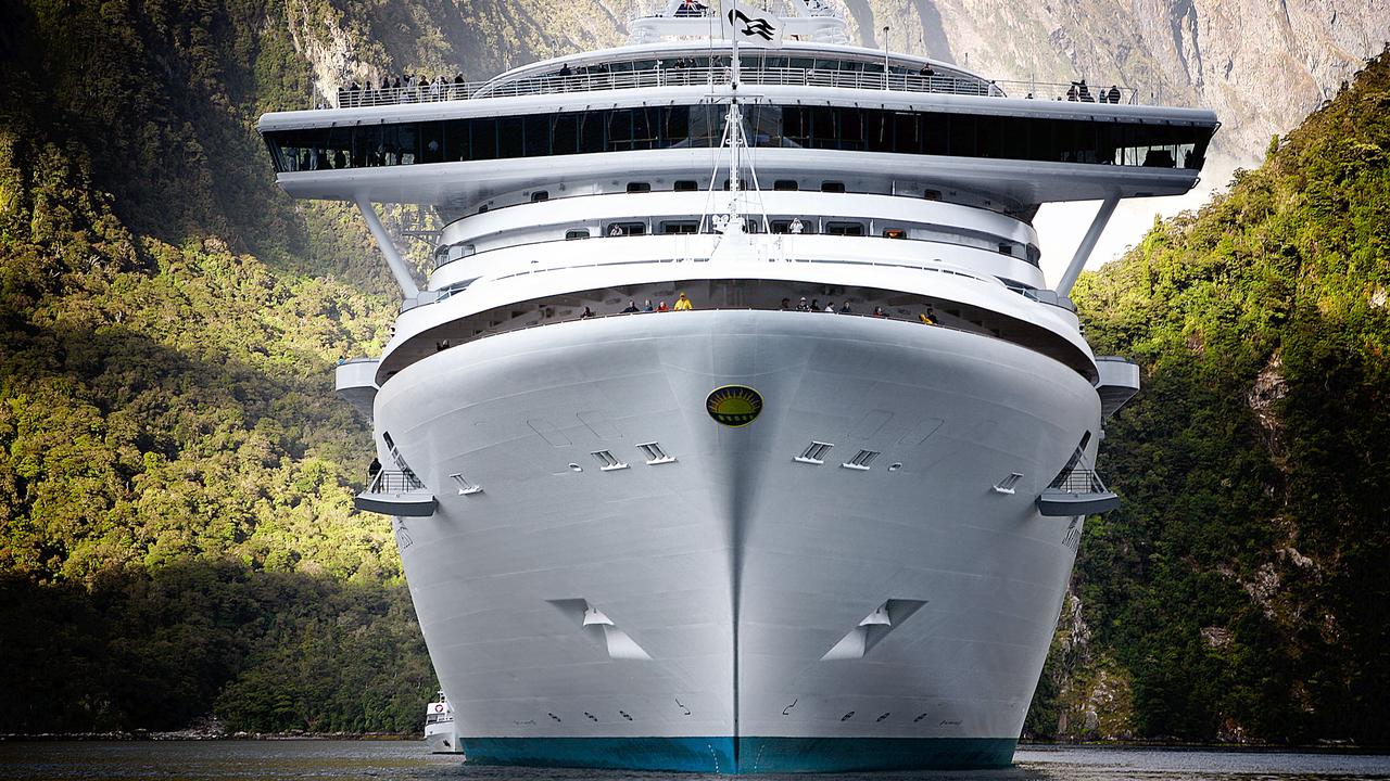 Cruise liner Sapphire Princess sailing through Milford Sound in New Zealand in an image captured from the ship's fast rescue craft.