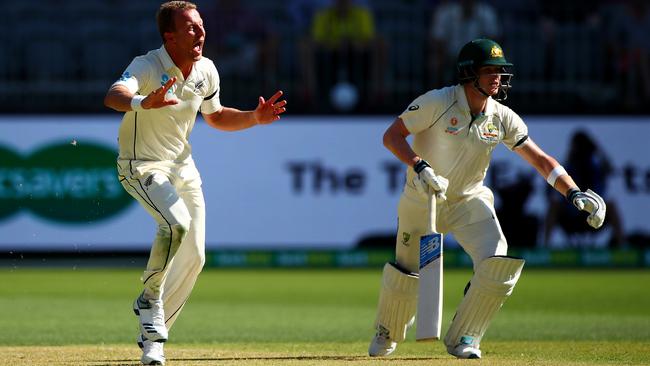 Neil Wagner reacts after a close call with Stebe Smith. Picture: Getty Images